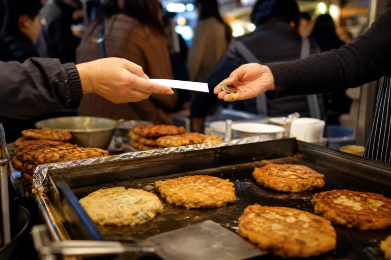 Gwangjang Market price controversy bindaetteok alley Seoul trend